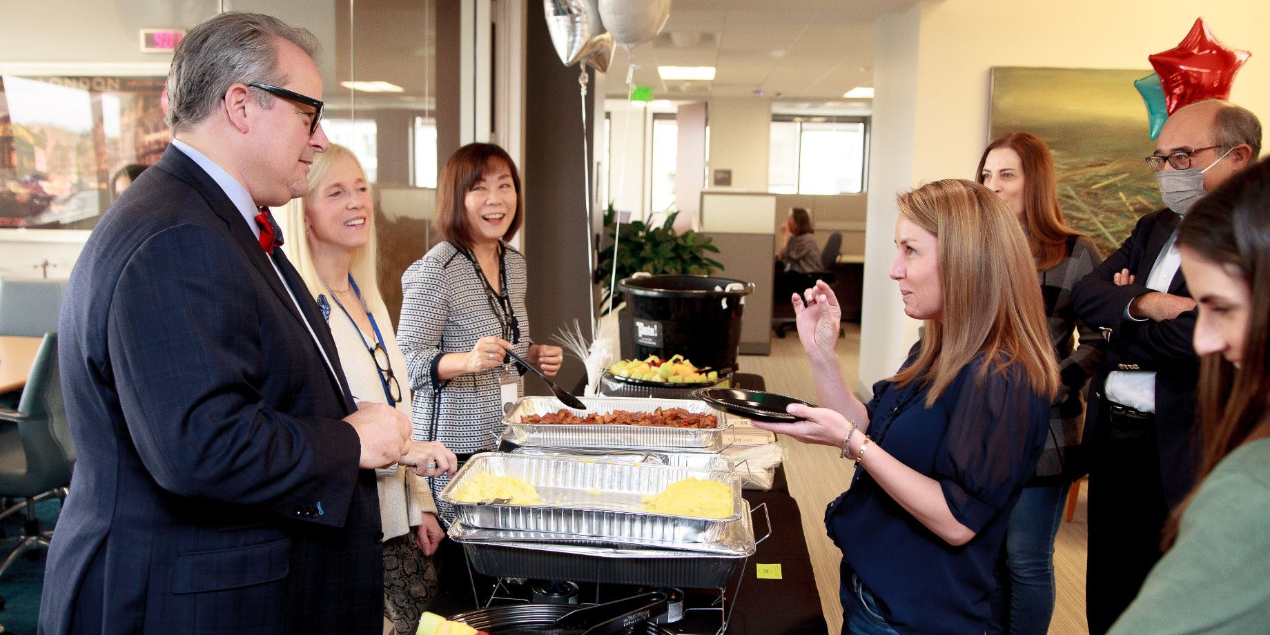 Employee Appreciation Day—Senior Management serves employees with breakfast.
