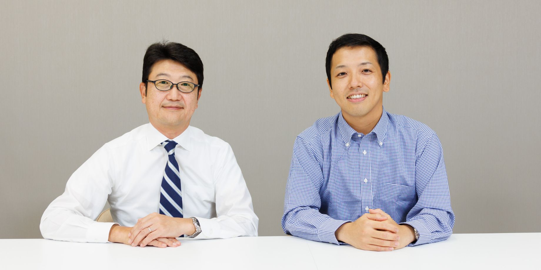 Toshiyuki Otobe, Executive Officer and President of the Personnel Unit (left) and Shinsaku Takano of the DX Strategy Division (right)