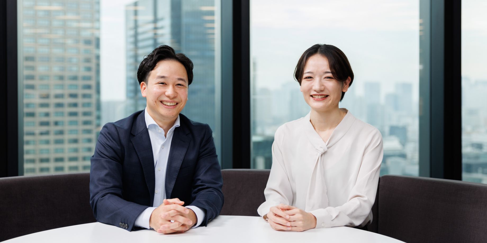 Mr. Kakizaki (left: a third-year employee) in the Equipment Leasing operating segment and Ms. Matsumoto (right: a second-year employee) in the Specialty Financing operating segment